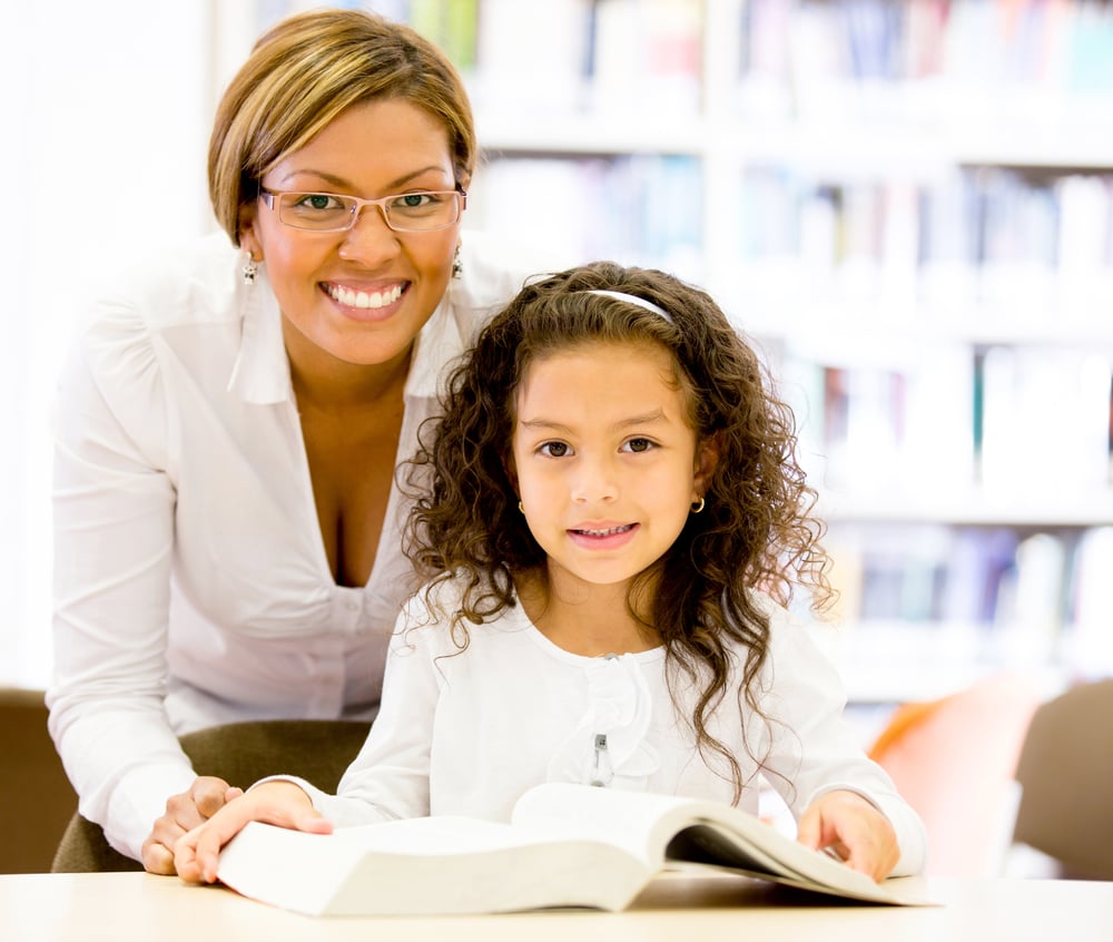 Teacher with a young student at the elementary school